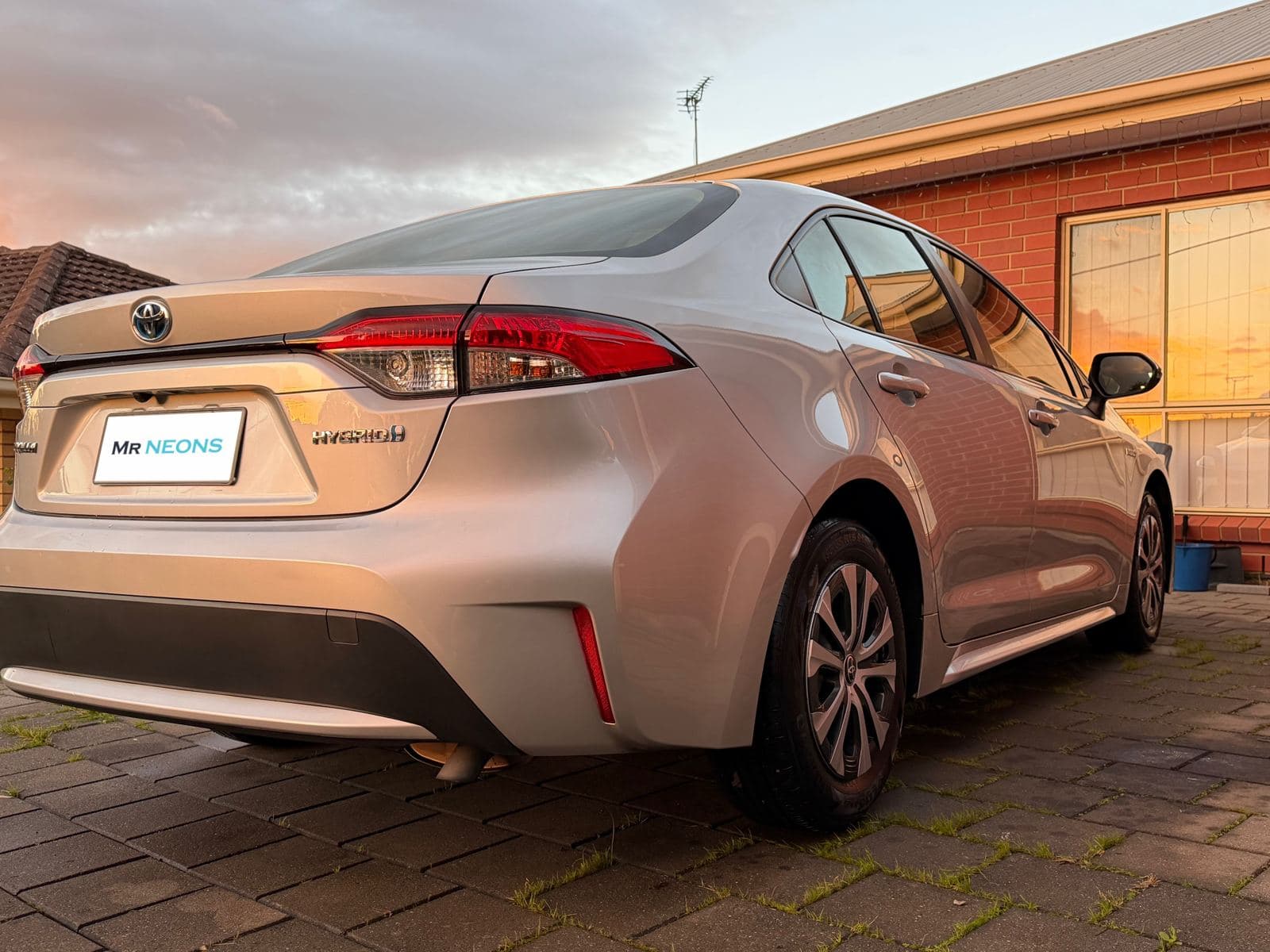 Toyota Corolla hybrid gleaming after a full detail at sunset