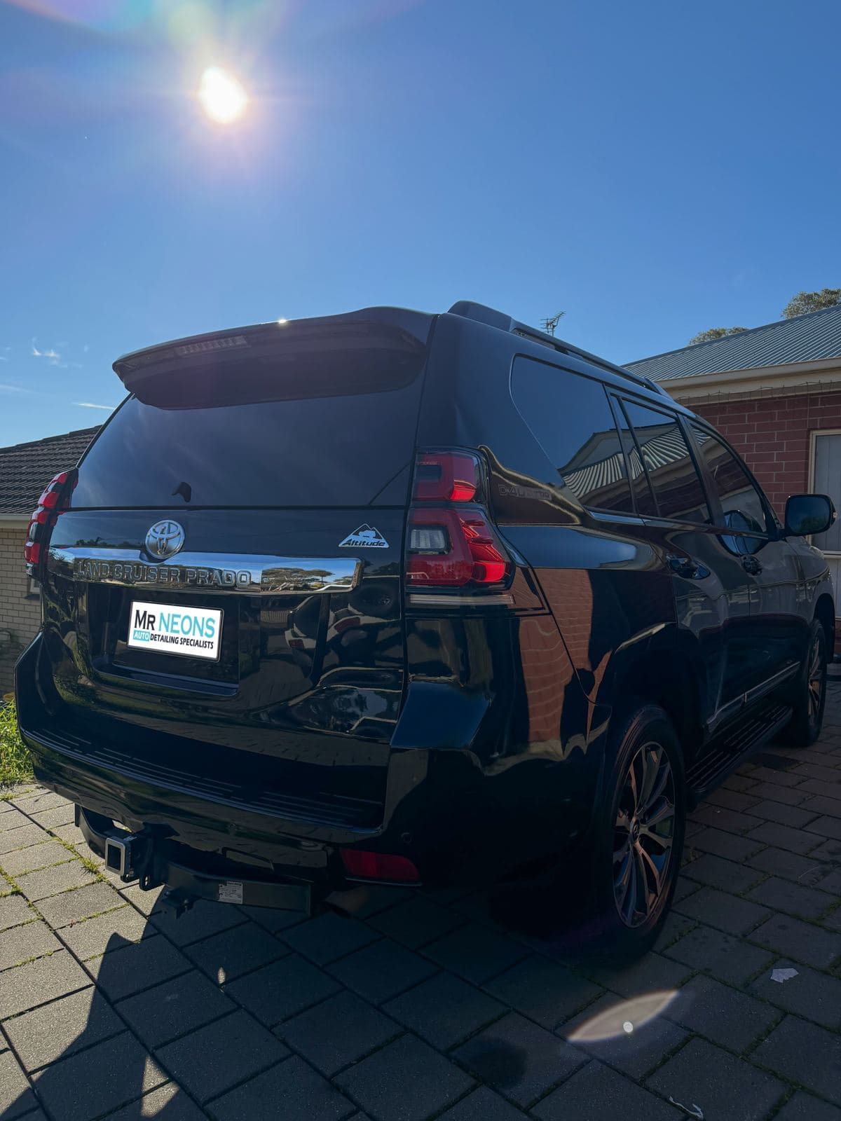 Black Toyota Prado detailed, rear view