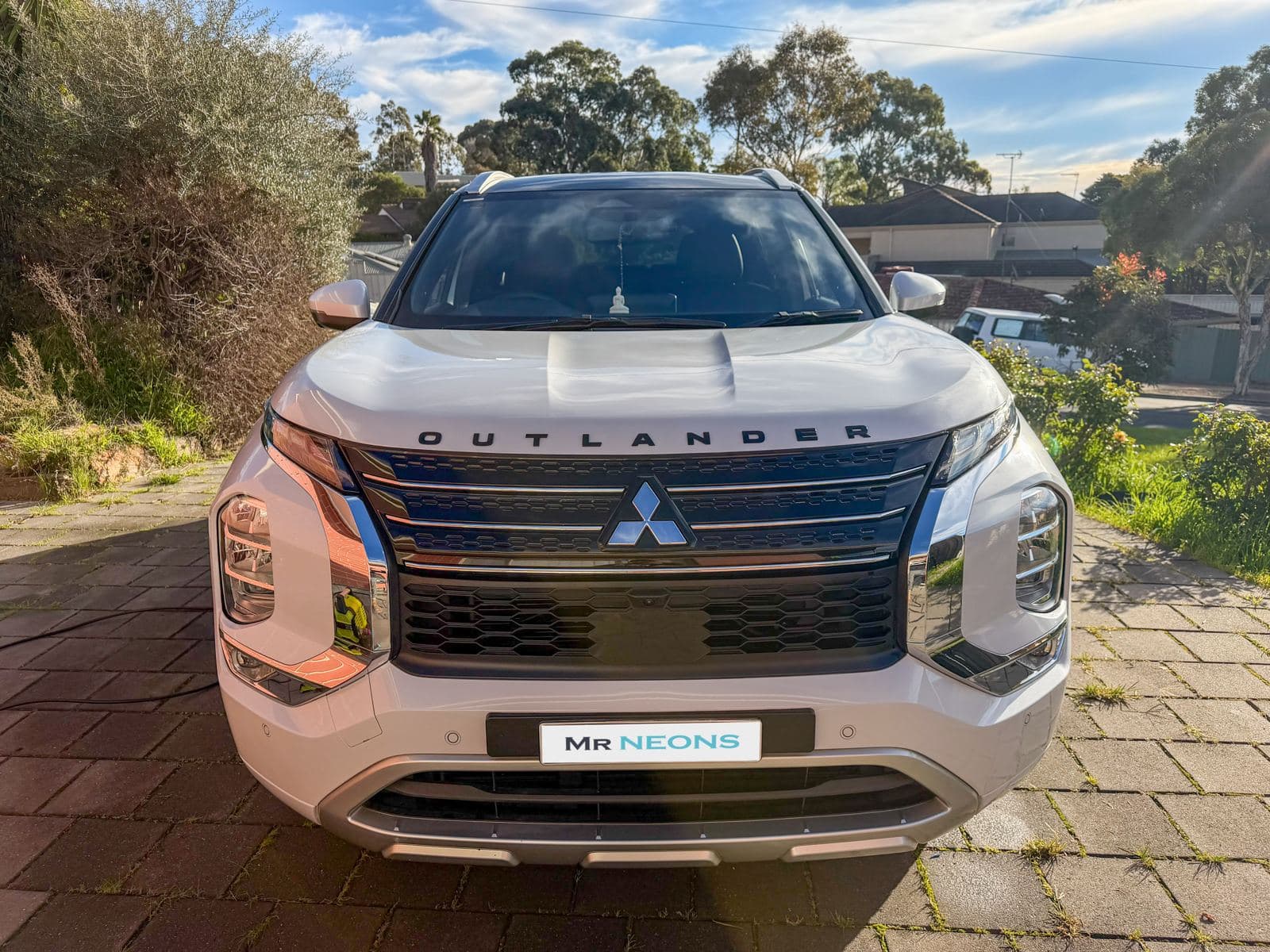 Mitsubishi Outlander finished in golden-hour light