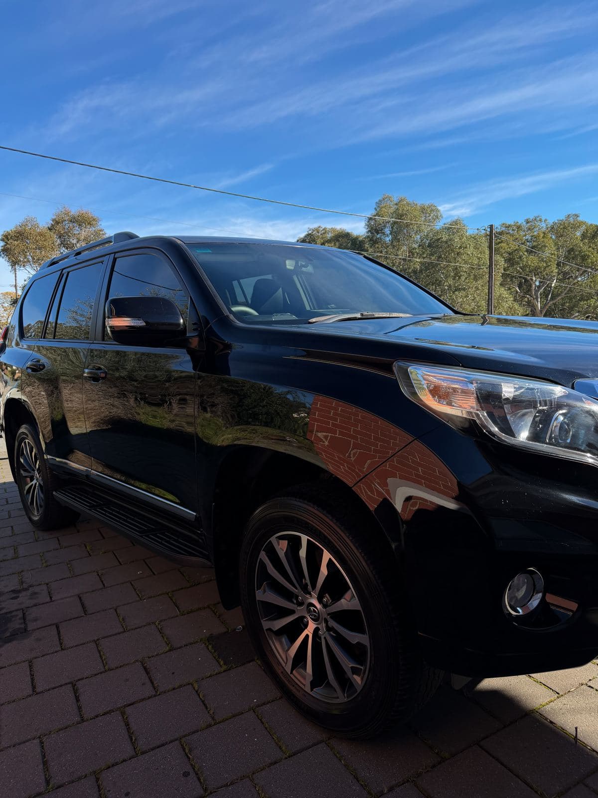 Toyota Prado gleaming after a full wash