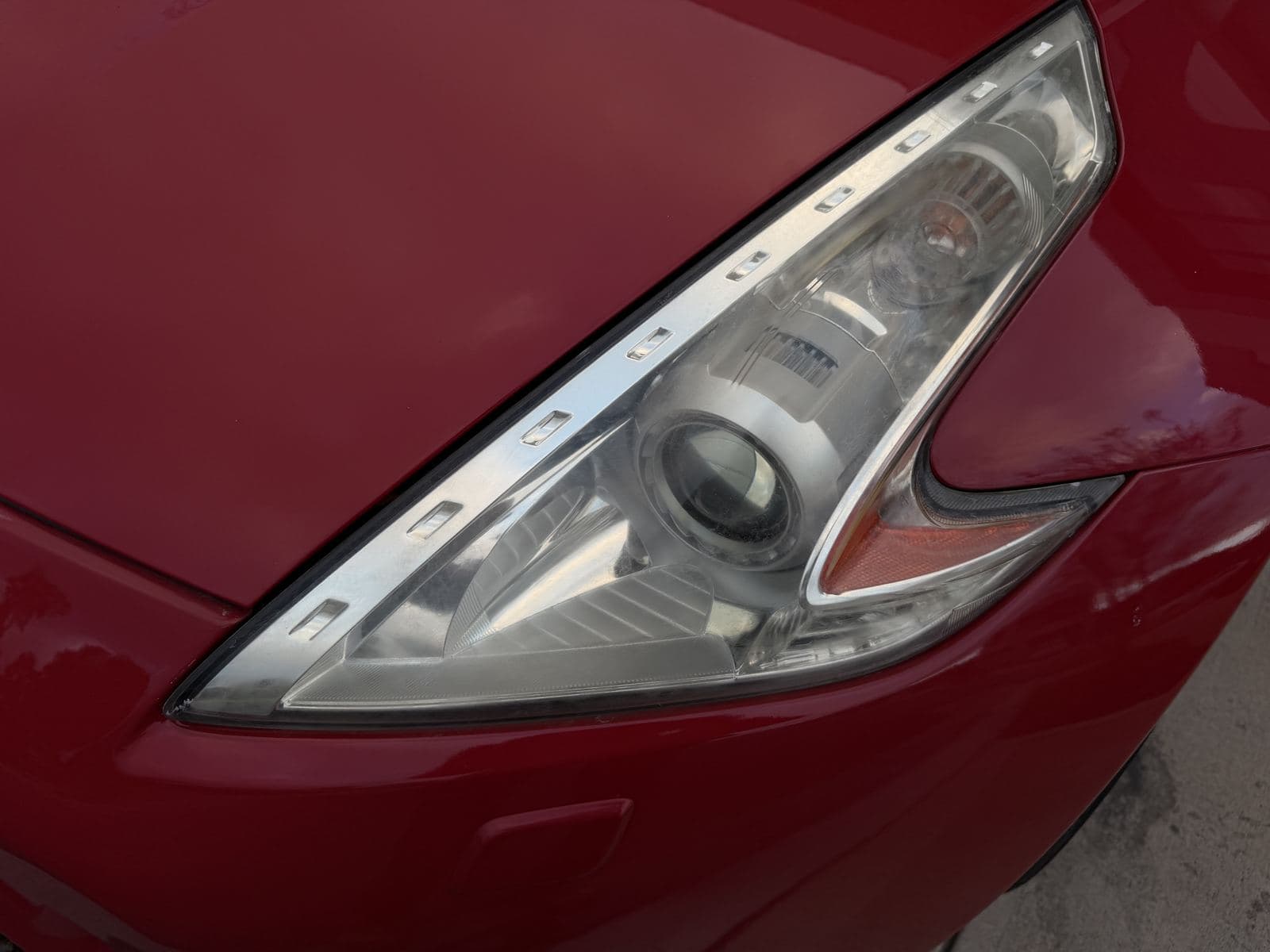 Before: hazy, faded 370Z headlight