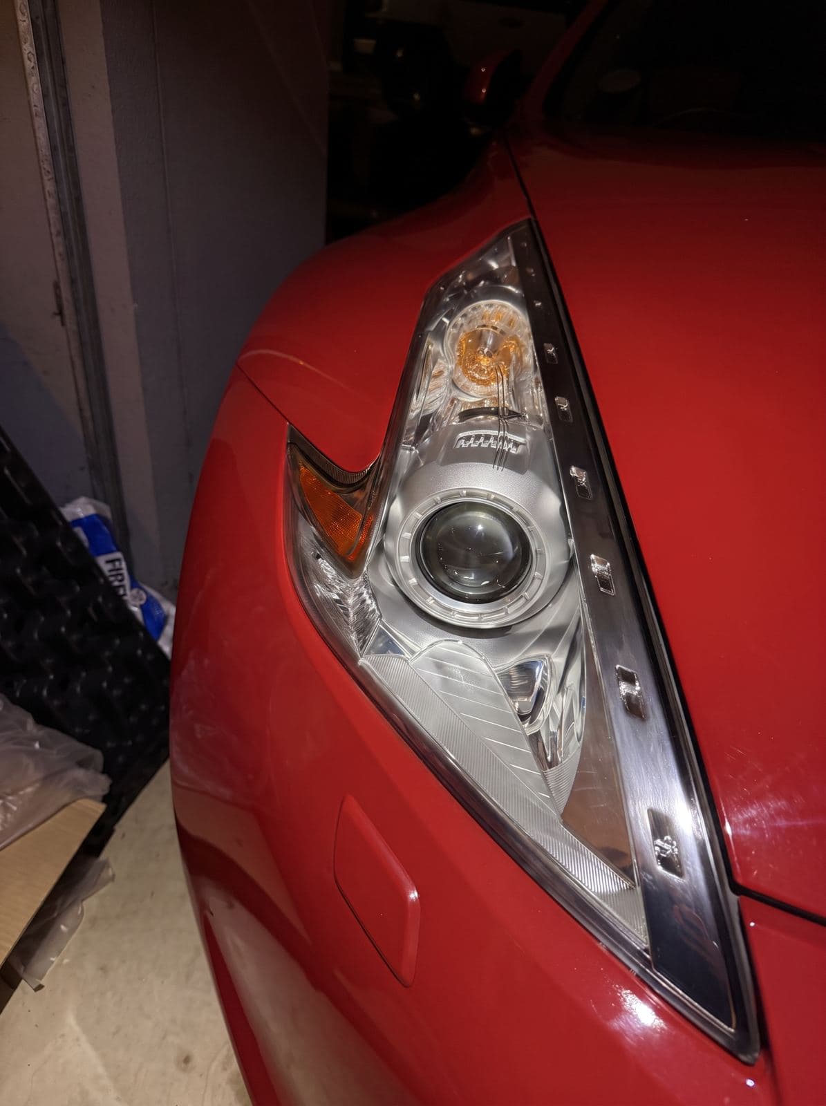 After: restored crystal-clear 370Z headlight