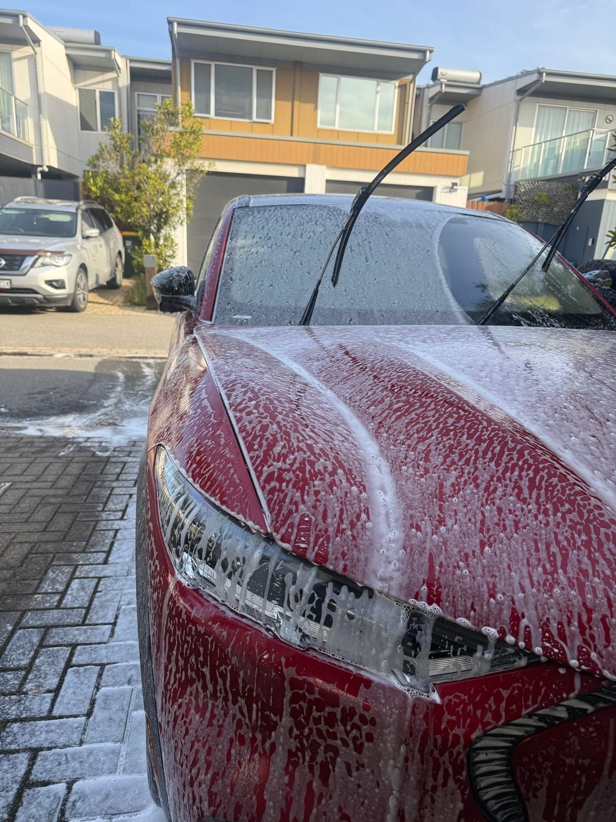 Snow foam on the Mach-E bonnet and headlight